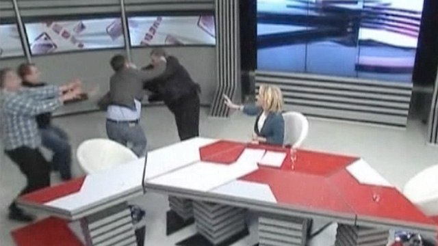 Two Georgian MPs fighting during a live TV debate