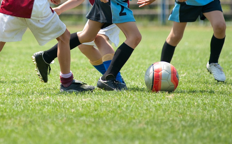 kids playing football outside
