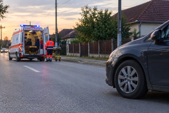 Dusk Ambulance Response on Village Street